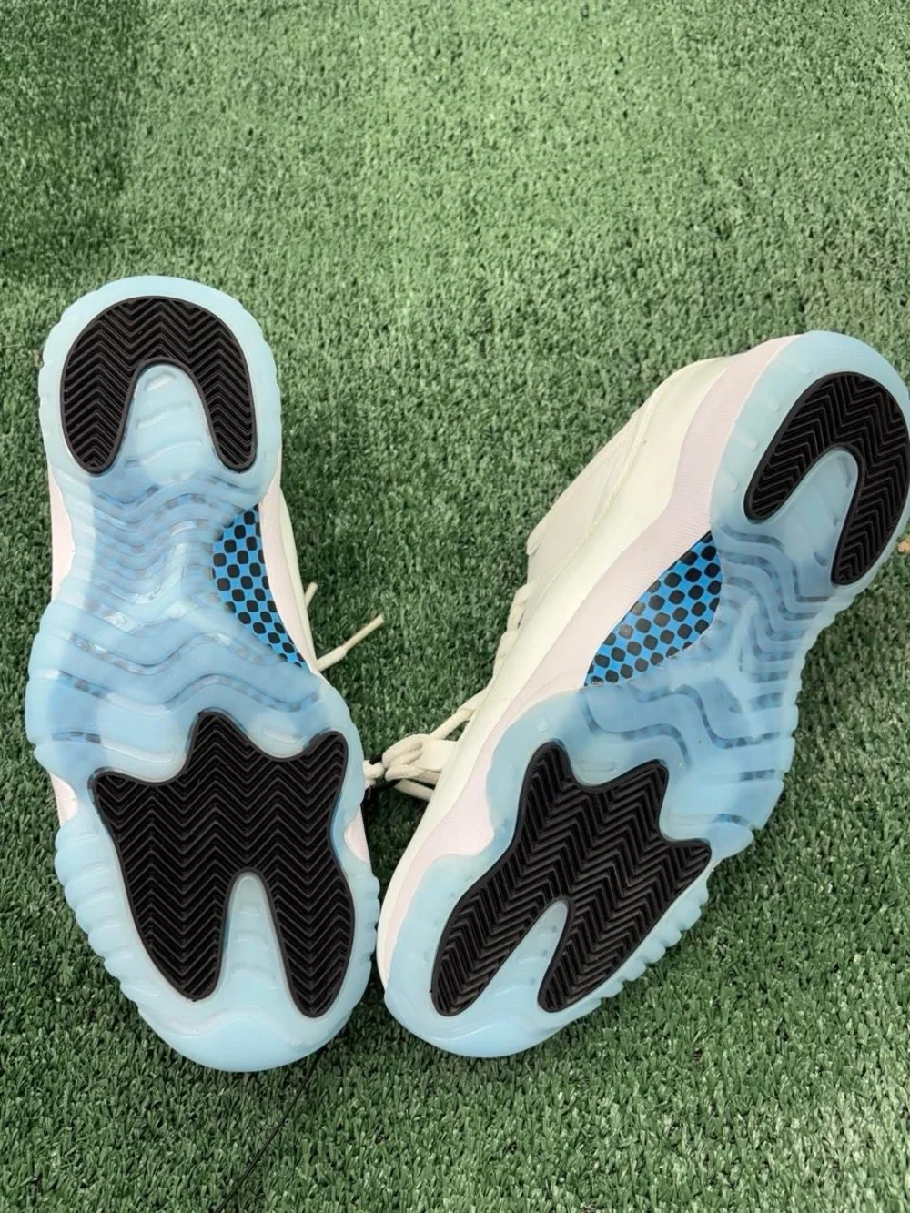 Jordan Men's White Athletic Shoes with Black Interior and Light Blue Accents